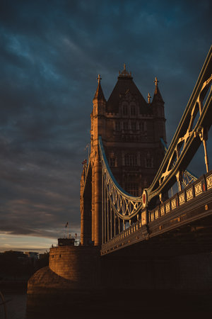Thames River Embankment, London | UK - 2021.06.26: Beautiful sunny evening sunset view of the Tower Bridge with the cloudy blue skyのeditorial素材
