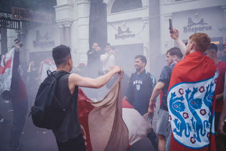London | UK - 2021.07.12: English fans waving flags at Leicester Square before the final Euro 2020 Football gameのeditorial素材