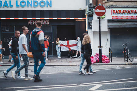 London | UK - 2021.07.12: Football fans urinating on the streets in SOHOのeditorial素材