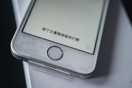 London | UK - 2021.10.09: Close up product photos of Iphone SE in silver color sealed in plastic on...