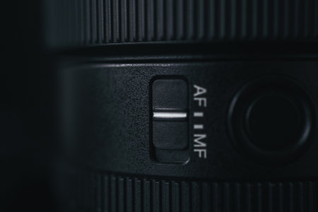 London | UK - 2021.10.09: Close up product photos of Sony FE 24mm F1.4 GM lens on black deskのeditorial素材
