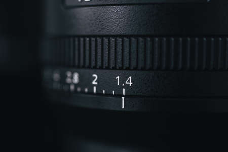 London | UK - 2021.10.09: Close up product photos of Sony FE 24mm F1.4 GM lens on black deskのeditorial素材