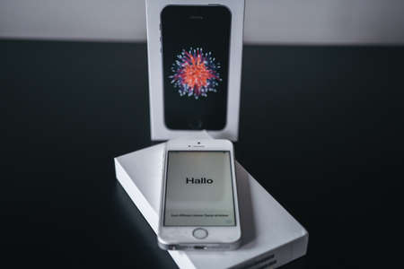 London | UK - 2021.10.09: Close up product photos of Iphone SE in silver color sealed in plastic on boxのeditorial素材