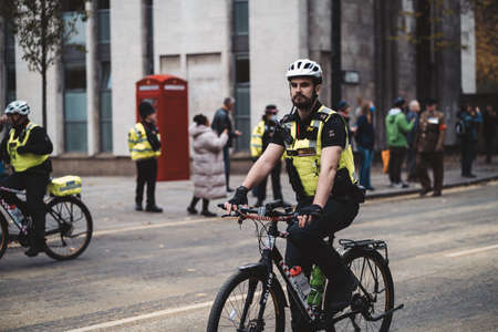 London, UK - 2021.11.13: Metropolitan police officers on bicycles at the Lord Mayor of London show paradeのeditorial素材