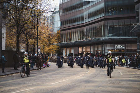 London, UK - 2021.11.13: Metropolitan police officers on bicycles at the Lord Mayor of London show paradeのeditorial素材