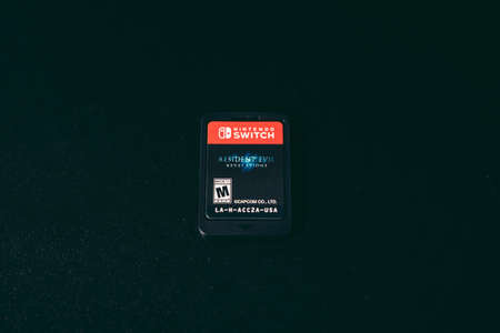 London, UK - 2021.11.27: Product close-up shot of Nintendo Switch Resident Evil Revelation Game Cardのeditorial素材