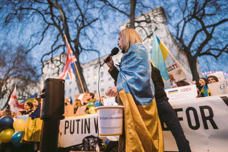 Downing Street, London | UK -  2022.02.25: Ukrainian people protest, thousands gather to demand tougher sanctions on Russia from British Government, EU and USA to stop the war in Ukraineのeditorial素材