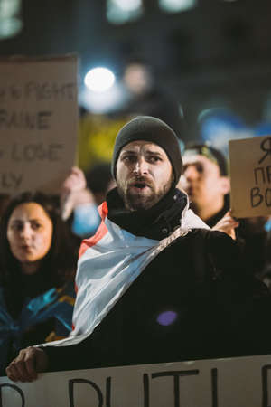 Downing Street, London | UK -  2022.02.25: Ukrainian people protest, thousands gather to demand tougher sanctions on Russia from British Government, EU and USA to stop the war in Ukraineのeditorial素材
