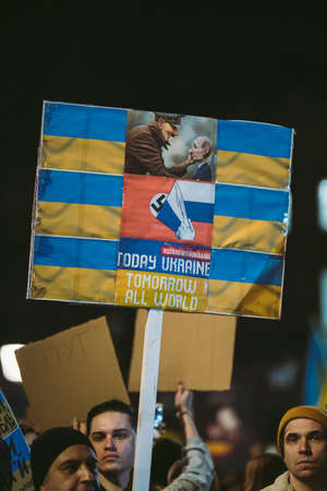 Downing Street, London | UK -  2022.02.25: Ukrainian people with banners and flags gather to demand tougher sanctions on Russia from British Government, EU and USA to stop the war in Ukraineのeditorial素材