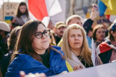 Downing Street, London | UK -  2022.02.26: Ukrainian people protest, thousands gather to demand...