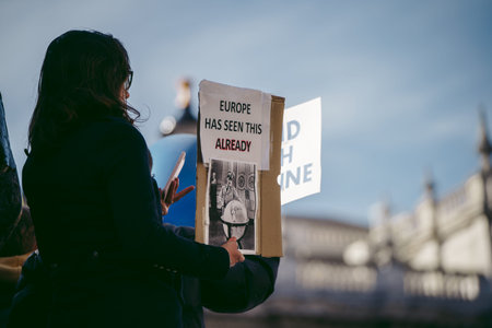 Downing Street, London | UK -  2022.02.26: Ukrainian people protest, thousands gather to demand tougher sanctions on Russia from British Government, EU and USA to stop the war in Ukraineのeditorial素材