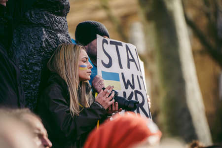 Downing Street, London | UK -  2022.02.26: Ukrainian people protest, thousands gather to demand tougher sanctions on Russia from British Government, EU and USA to stop the war in Ukraineのeditorial素材