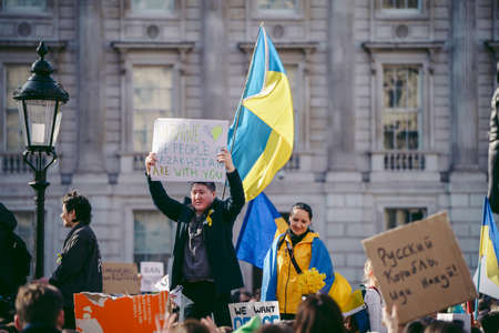 Downing Street, London | UK -  2022.02.26: Ukrainian people protest, thousands gather to demand tougher sanctions on Russia from British Government, EU and USA to stop the war in Ukraineのeditorial素材