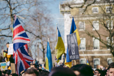 Downing Street, London | UK -  2022.02.26: Ukrainian people protest, thousands gather to demand tougher sanctions on Russia from British Government, EU and USA to stop the war in Ukraineのeditorial素材