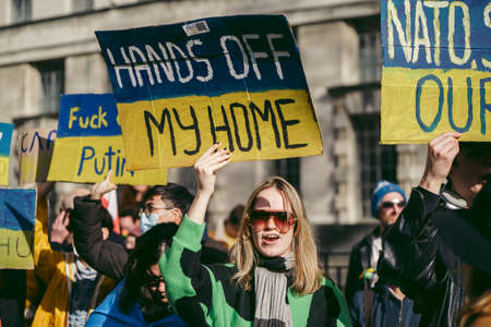 Downing Street, London | UK -  2022.02.26: Ukrainian people protest, thousands gather to demand tougher sanctions on Russia from British Government, EU and USA to stop the war in Ukraineのeditorial素材