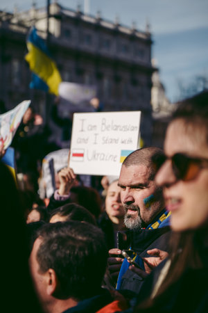 Downing Street, London | UK -  2022.02.26: Ukrainian people protest, thousands gather to demand...
