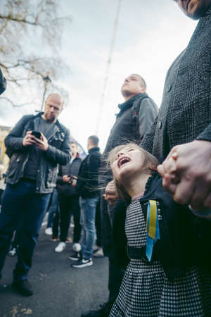 Downing Street, London | UK -  2022.02.26: Ukrainian people protest, thousands gather to demand tougher sanctions on Russia from British Government, EU and USA to stop the war in Ukraineのeditorial素材