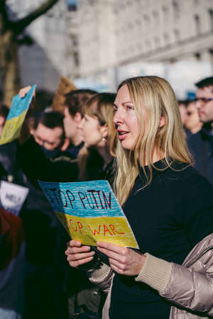 Downing Street, London | UK -  2022.02.26: Ukrainian people protest, thousands gather to demand tougher sanctions on Russia from British Government, EU and USA to stop the war in Ukraineのeditorial素材