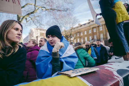 Downing Street, London | UK -  2022.02.26: Ukrainian people protest, thousands gather to demand tougher sanctions on Russia from British Government, EU and USA to stop the war in Ukraineのeditorial素材