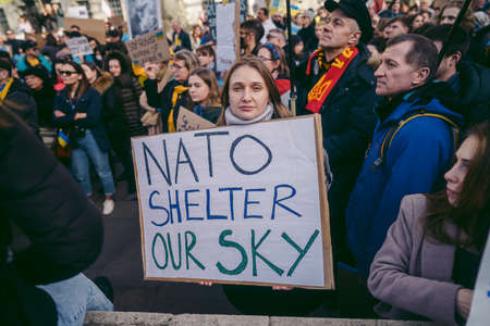 Downing Street, London | UK -  2022.02.26: Ukrainian people protest, thousands gather to demand tougher sanctions on Russia from British Government, EU and USA to stop the war in Ukraineのeditorial素材