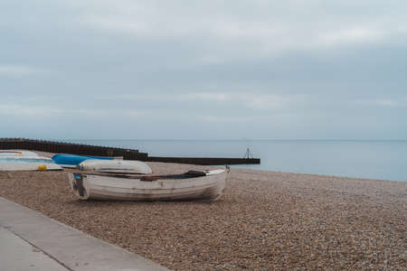 Seaford, East Sussex | UK. Boats moored at the beach during Coronavirus pandemic Lockdownのeditorial素材