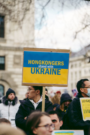 Parliament Square, London | UK -  2022.03.06: Ukrainian people protest, thousands gather to demand...