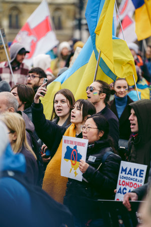 Parliament Square, London | UK -  2022.03.06: Ukrainian people protest, thousands gather to demand...