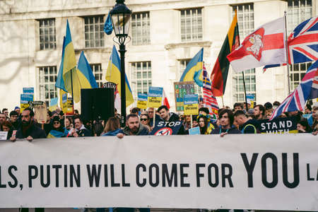 Downing Street, London | UK -  2022.03.12: Ukrainian people protest, thousands gather to demand tougher sanctions on Russia from British Government, EU and USA to stop the war in Ukraineのeditorial素材