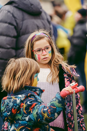 Downing Street, London | UK -  2022.03.13: Kids with flags and banners at the Ukrainian protest...