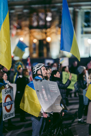 Trafalgar Square, London | UK -  2022.03.15: Ukrainian people protest, thousands gather to demand...