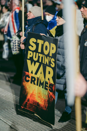 Trafalgar Square, London | UK -  2022.03.15: Ukrainian people protest, thousands gather to demand...