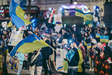 Trafalgar Square, London | UK -  2022.03.15: Ukrainian people protest, thousands gather to demand...