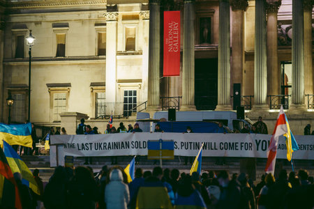 Trafalgar Square, London | UK -  2022.03.08: Ukrainian people protest, thousands gather to demand...