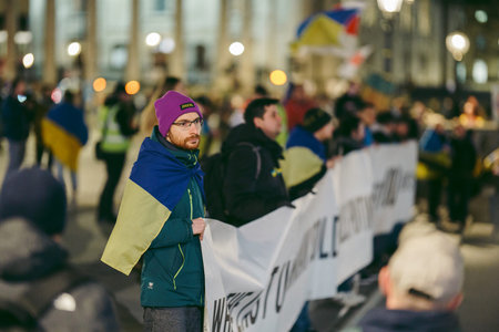 Trafalgar Square, London | UK -  2022.03.09: Ukrainian people protest, thousands gather to demand...