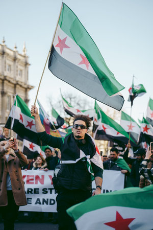 Downing Street, London | UK -  2022.03.19: Syrian and Ukrainian people protest, gather to demand...