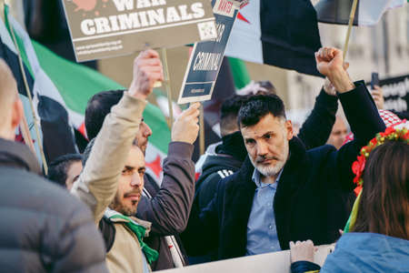 Downing Street, London | UK -  2022.03.19: Syrian and Ukrainian people protest, gather to demand tougher sanctions on Russia from British Government, EU and USA to stop the war in Ukraineのeditorial素材