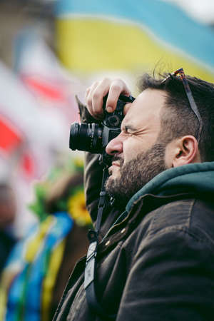 Trafalgar Square, London | UK -  2022.03.20: Ukrainian people protest, thousands gather to demand tougher sanctions on Russia from British Government, EU and USA to stop the war in Ukraineのeditorial素材