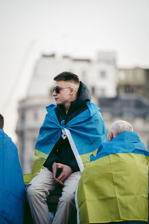Trafalgar Square, London | UK -  2022.03.20: Ukrainian people protest, thousands gather to demand...