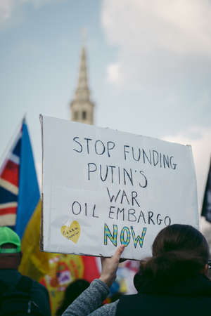 Trafalgar Square, London | UK -  2022.03.20: Ukrainian people protest, thousands gather to demand...