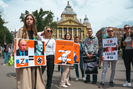 Budapest | Hungary - 2022.03.08: People with flags in Budapest gather to support Ukrainians and stop the war started by russiaのeditorial素材