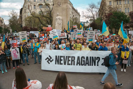 Budapest | Hungary - 2022.03.08: People with flags in Budapest gather to support Ukrainians and stop the war started by russiaのeditorial素材