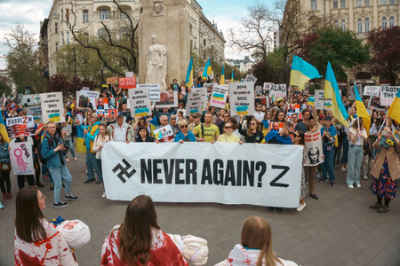 Budapest | Hungary - 2022.03.08: People with flags in Budapest gather to support Ukrainians and stop the war started by russiaのeditorial素材