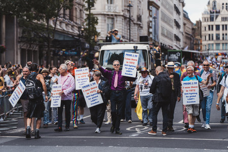 London / UK - 02/07/2022: People from 1970 with flags and banners celebrating London LGBTQ Pride Paradeのeditorial素材