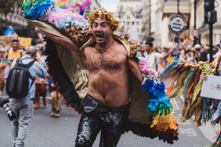London / UK - 02/07/2022: People with flags and banners celebrating London LGBTQ Pride Paradeのeditorial素材