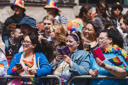 London / UK - 02/07/2022: People with flags and banners celebrating London LGBTQ Pride Paradeのeditorial素材