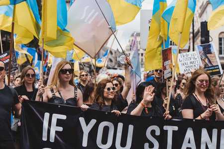 London / UK - 02/07/2022: Ukrainian people with flags and banners celebrating London LGBTQ Pride Paradeのeditorial素材