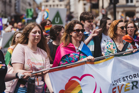 London / UK - 02/07/2022: People with flags and banners celebrating London LGBTQ Pride Paradeのeditorial素材