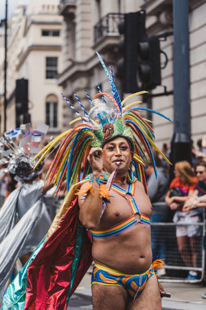London / UK - 02/07/2022: People with flags and banners celebrating London LGBTQ Pride Paradeのeditorial素材