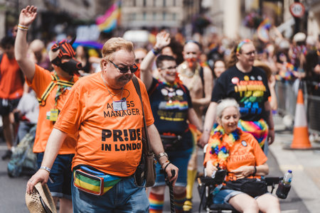 London / UK - 02/07/2022: People with flags and banners celebrating London LGBTQ Pride Paradeのeditorial素材