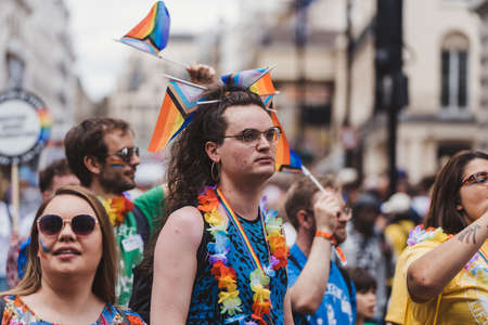 London / UK - 02/07/2022: People with flags and banners celebrating London LGBTQ Pride Paradeのeditorial素材